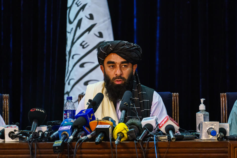 Zabihullah Mujahid, the Taliban spokesman for nearly two decades who worked in the shadows, makes his first-ever public appearance. Source: Getty
