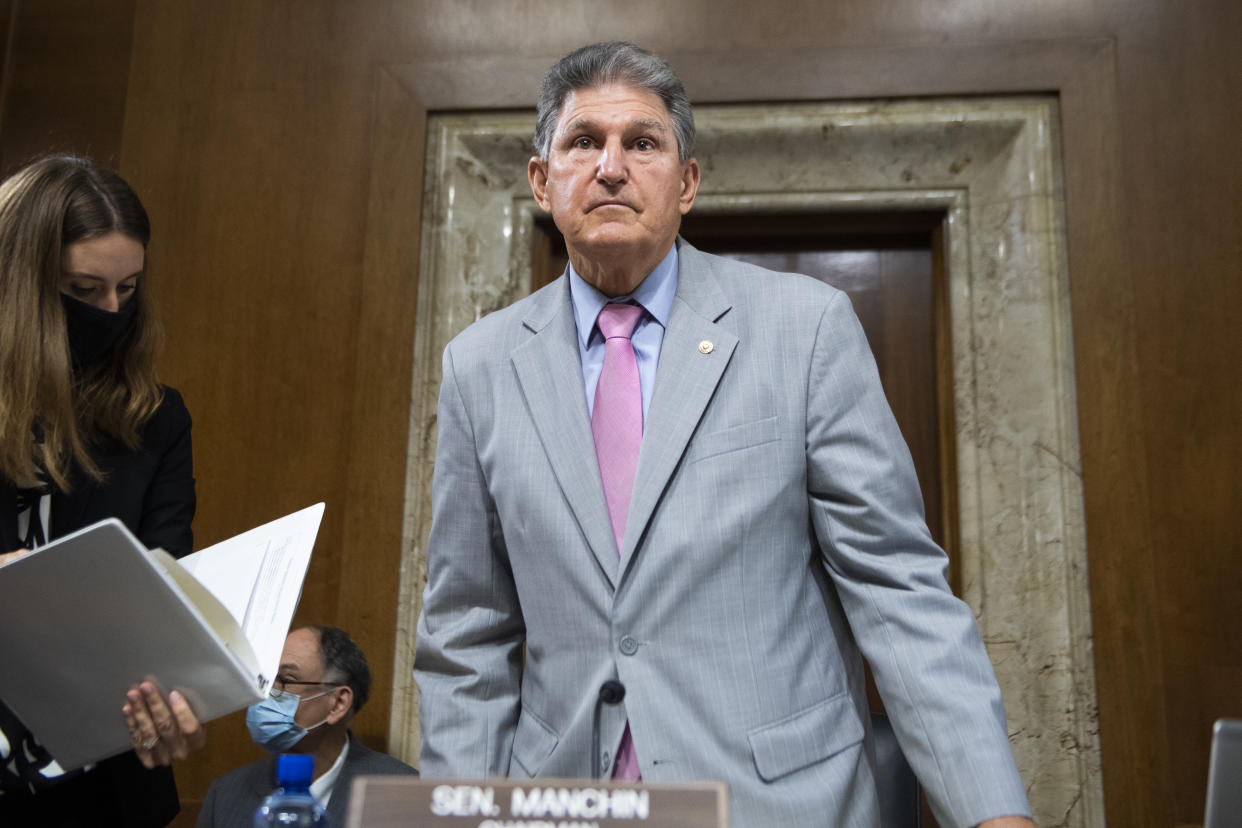 Chairman Joe Manchin, D-W. Va., arrives for the Senate Energy and Natural Resources Committee confirmation hearing for Tommy P. Beaudreau, nominee for deputy Interior secretary, in Dirksen Building on Thursday, April 29, 2021. (Tom Williams/CQ Roll Call via Getty Images)