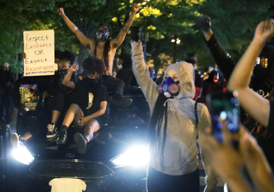 Demonstrators stage protest near the White House as Donald Trump reportedly hides underground. Source: Getty