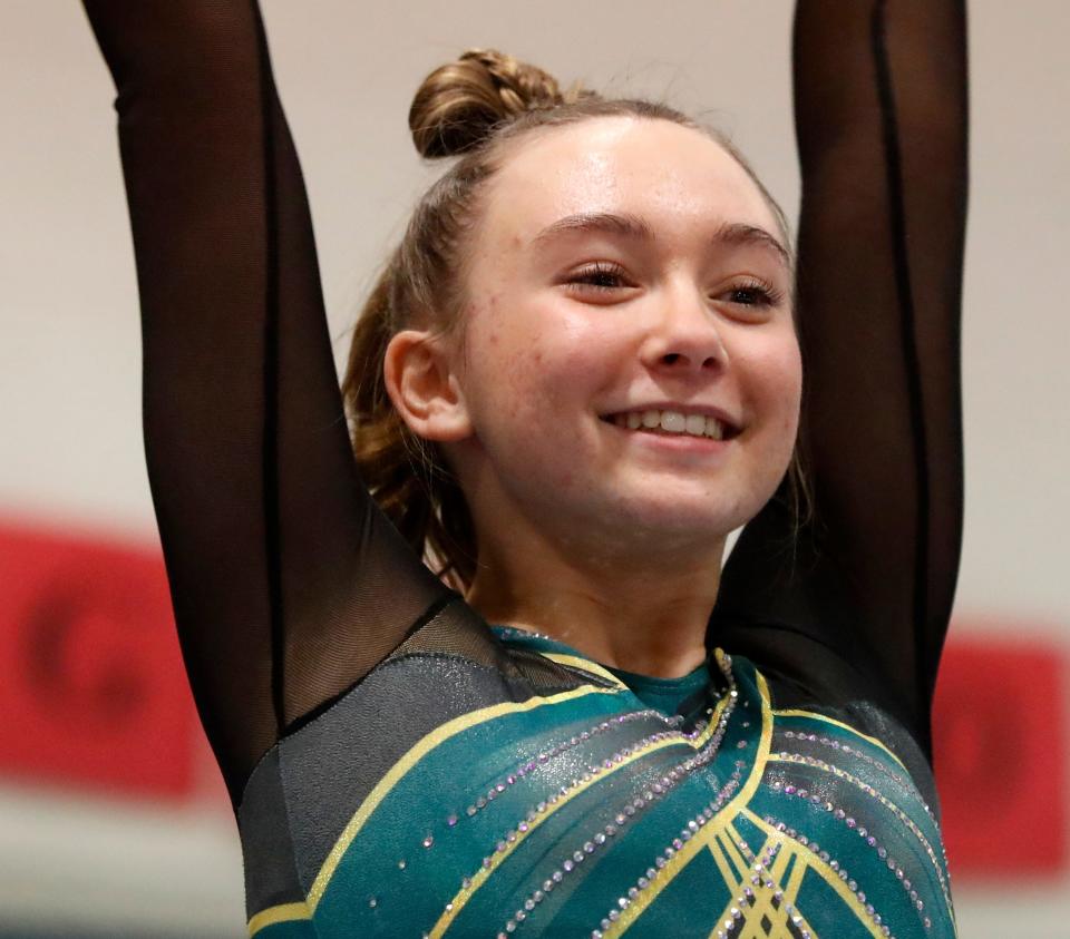 Benton Central Attalia Budreau smiles during the IHSAA gymnastics invitational, Wednesday, Jan. 17, 2024, at Linnwood Elementary School in Lafayette, Ind.