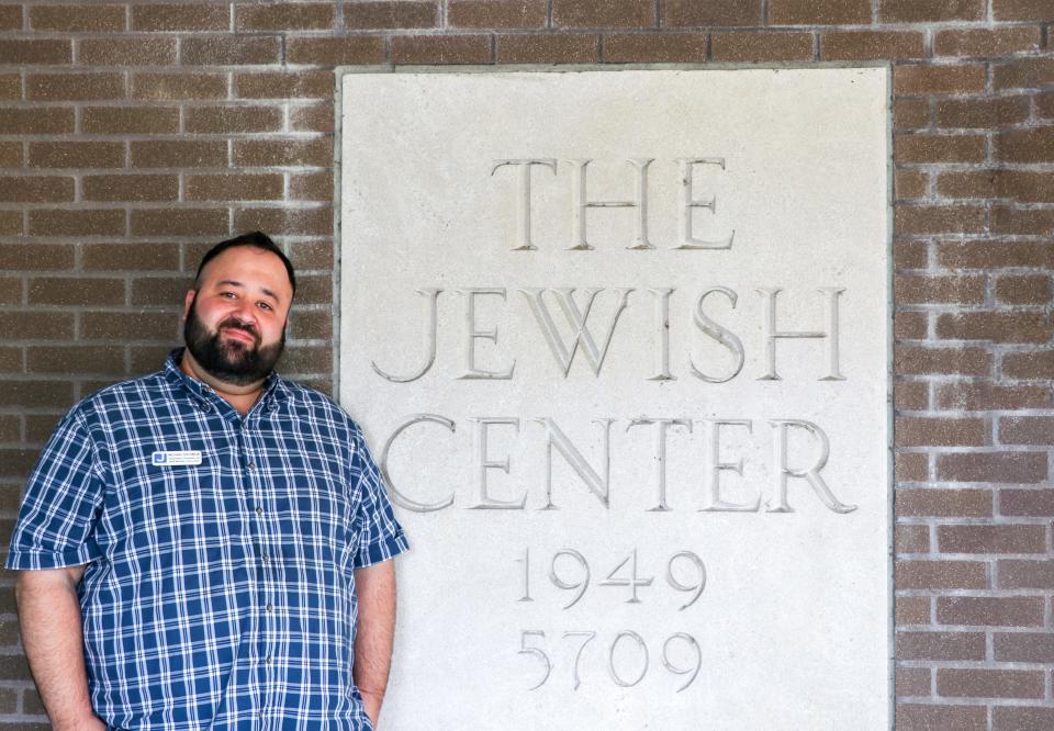 Michael Solomon, the Jewish Community Center theater program director leading Gallery Players, in front of the JCC building.