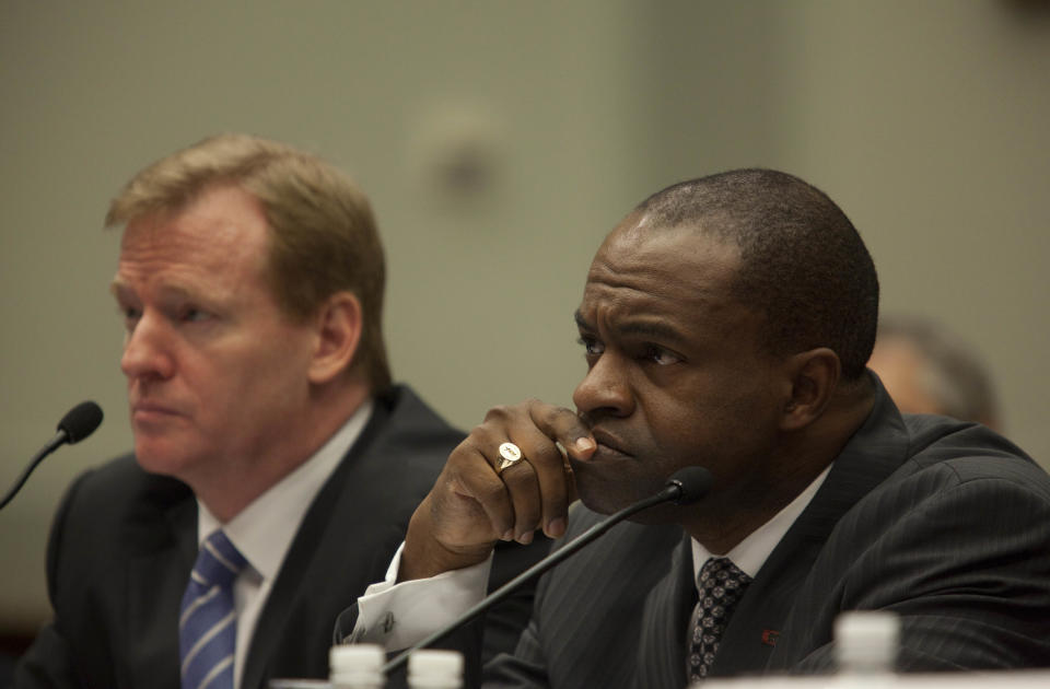 DeMaurice Smith (right) has been instrumental in securing several new NFL labor agreements as executive director of the NFL Players Association over the past 14 years.  (Getty Images)