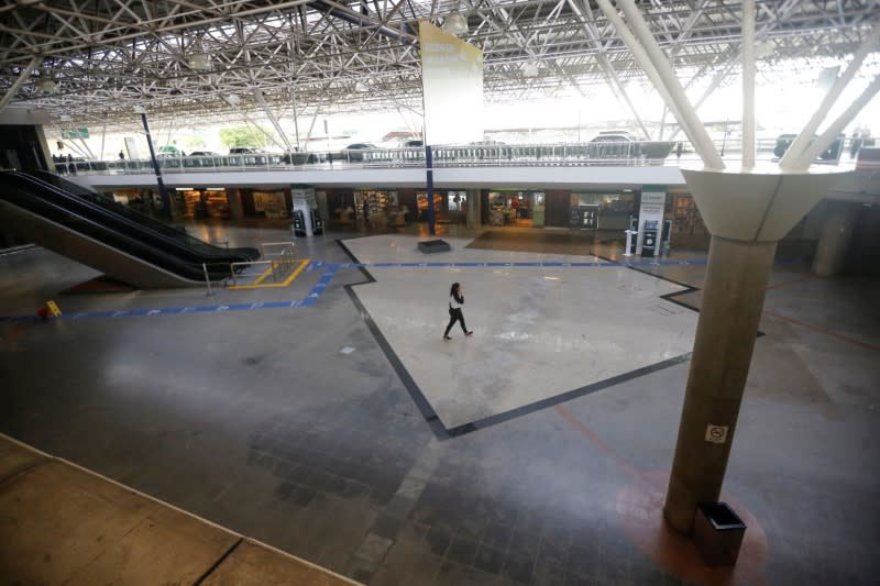 General view of the empty hall of the Brazilian International Airport amid the coronavirus disease (COVID-19) outbreak in Brasilia