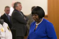 Ursula Ward, mother of the victim, walks back to her seat after former NFL player Aaron Hernandez was convicted in his murder trial at the Bristol County Superior Court in Fall River, Massachusetts, April 15, 2015. Hernandez, 25, a former tight end for the New England Patriots, is convicted of fatally shooting semiprofessional football player Odin Lloyd in an industrial park near Hernandez's Massachusetts home in June 2013. REUTERS/Dominick Reuter