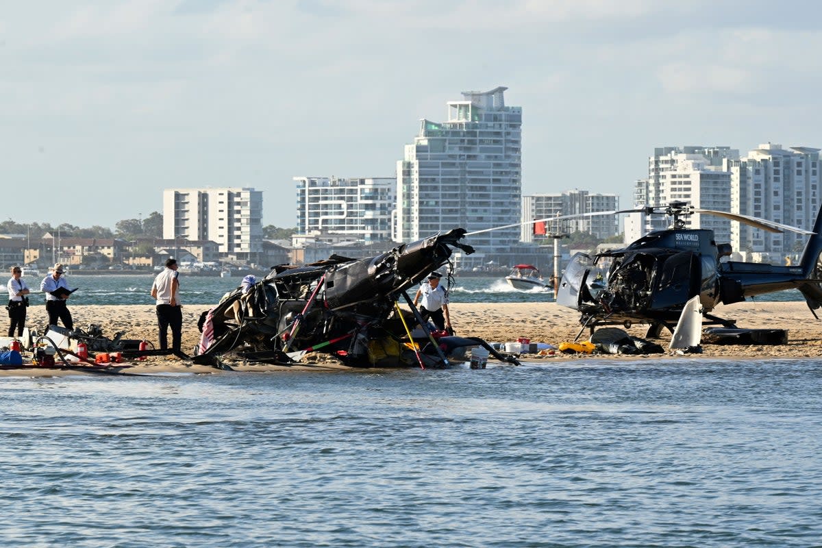 Two sightseeing helicopters crashed on the Gold Coast(Dave Hunt/AAP Image/AP) (AP)