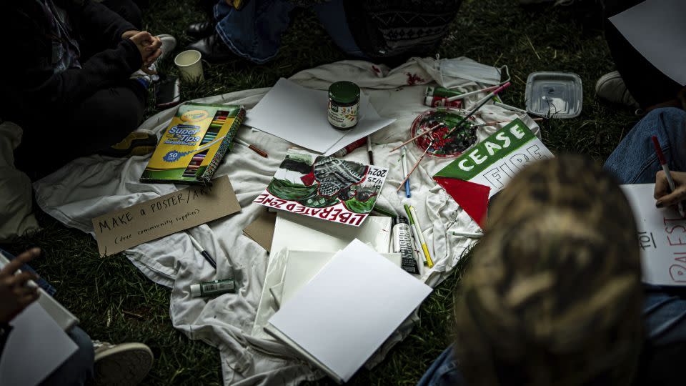 Pro-Palestinian demonstrators gather Thursday at a George Washington University encampment. - Natascha Tahabsem/Cover Images/AP