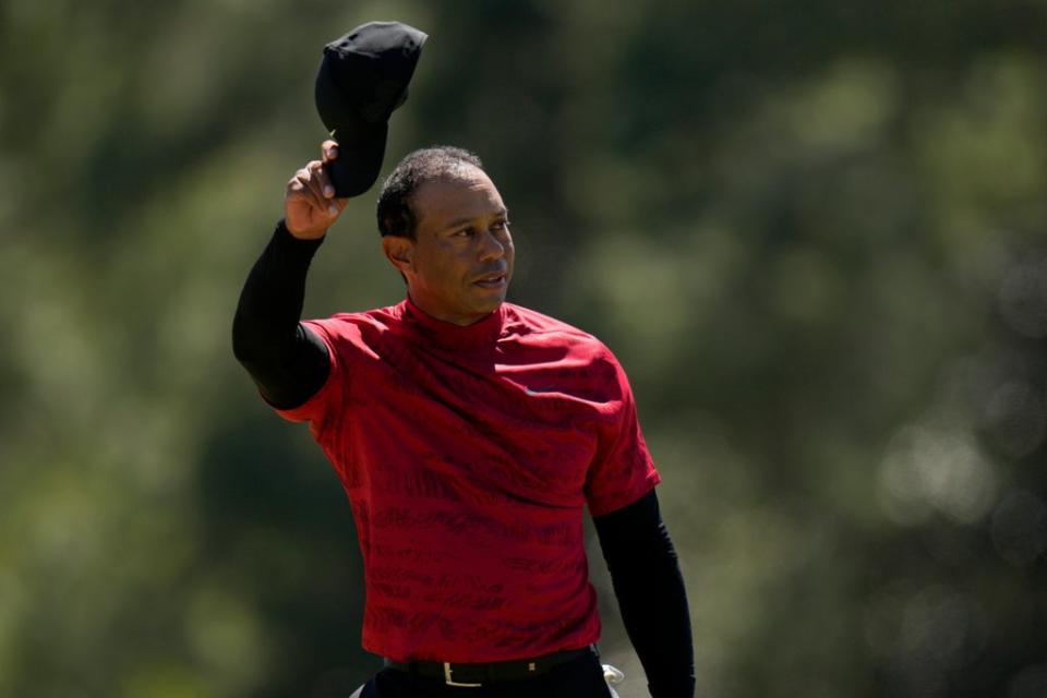 Tiger Woods tips his cap on the 18th green after his final round of the Masters (Jae C. Hong/AP) (AP)