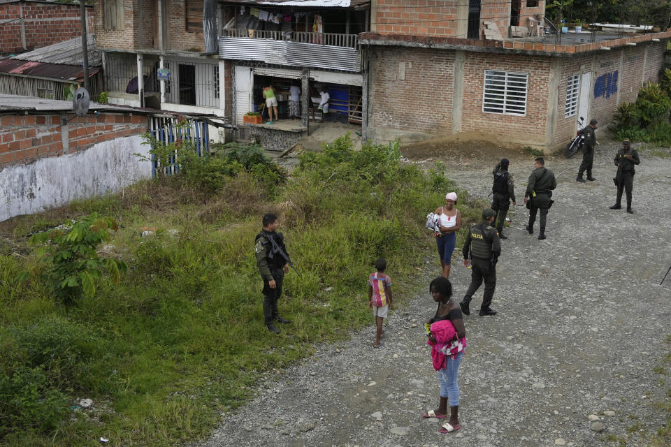 Police patrol in a neighborhood where the criminal gangs have a presence in Buenaventura, Colombia, Thursday, Aug. 17, 2023. In Buenaventura, turf wars have bred a particularly brutal conflict, making the city one of the world’s most violent. (AP Photo/Fernando Vergara)