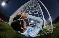 <span><b>6th most popular.</b><br>Argentina's Lionel Messi falls in the net during the Copa America 2015 final soccer match against Chile at the National Stadium in Santiago, Chile, July 4, 2015. (REUTERS/Ivan Alvarado)</span>