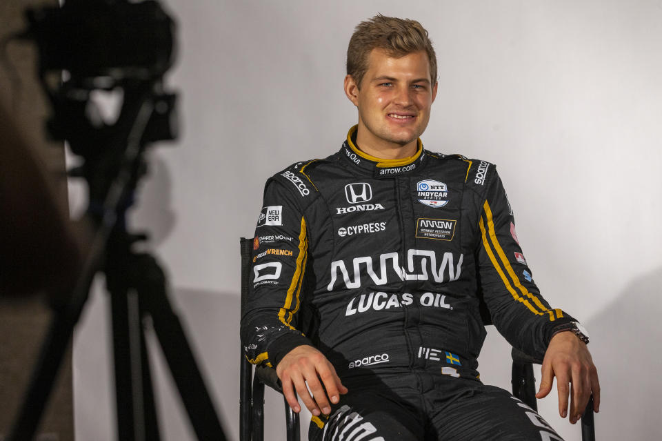 FILE - In this Feb. 11, 2019, file photo, IndyCar driver Marcus Ericsson, of Sweden, is interviewed during IndyCar auto racing media day, in Austin, Texas. The IndyCar season opens Sunday, March 10, 2019, in St. Petersburg, Fla. Among the newcomers are Felix Rosenqvist, the new teammate to Dixon at Chip Ganassi Racing, and Marcus Ericsson, who fills Robert Wickens' seat at Arrow Schmidt Peterson Motorsports. (AP Photo/Stephen Spillman, File)