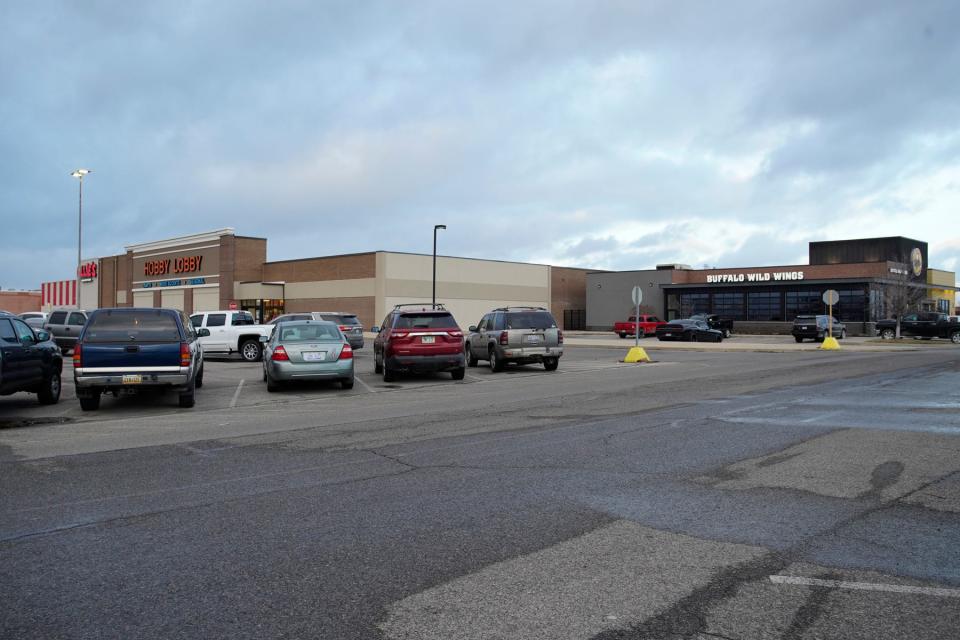 Businesses at the Adrian Mall, include from left, Ollie's Bargain Outlet, Hobby Lobby and Buffalo Wild Wings. These businesses have been credited with keeping the condemned mall relevant, according to a presentation last week to the Adrian Planning Commission. Because of their exterior-facing signs, the businesses are able to attract customers.