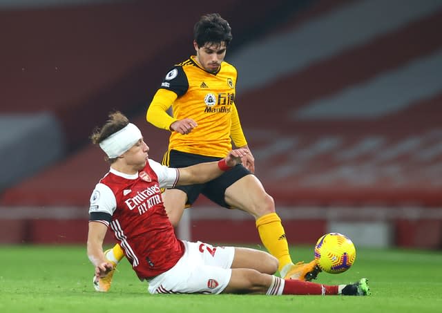 Arsenal’s David Luiz (left) returned to action with his head bandaged