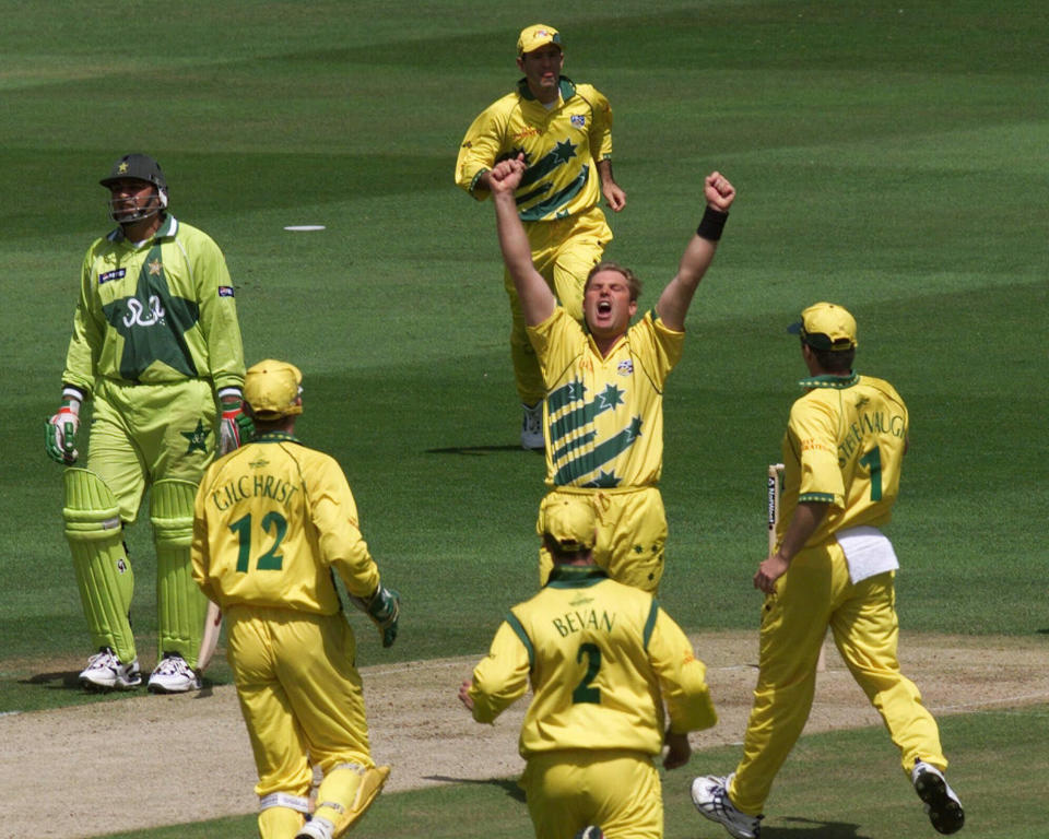 FILE - In this Sunday, June 20, 1999 file photo, Australia's Shane Warne celebrates taking the wicket of Pakistan's Ijaz Ahmed during the final of the Cricket World Cup between Australia and Pakistan at Lords in London. Pakistan's Inzimam -ul-Haq at left looks on. Warne was the star with four wickets in the final as Australia bowled out Pakistan for 132 at Lord's and eased to 133-2 from 20 overs thanks to Adam Gilchrist's 54 from 36 balls. (AP Photo/Alastair Grant, File)