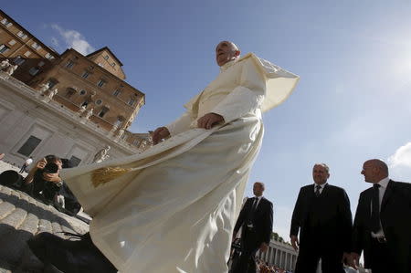Pope Francis arrives to lead his Wednesday general audience in Saint Peter's square at the Vatican June 17, 2015. REUTERS/Max Rossi