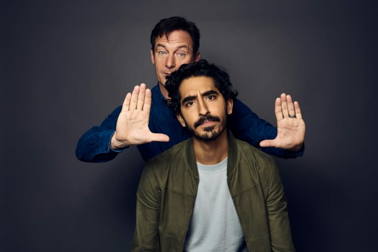 TORONTO - SEPTEMBER 07: Actors Jason Isaacs and Dev Patel from the film 'Hotel Mumbai' pose for a portrait during the 2018 Toronto International Film Festival