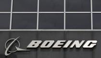 The Boeing logo is seen at their headquarters in Chicago, April 24, 2013. REUTERS/Jim Young