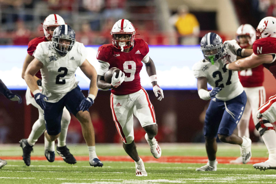 FILE - Nebraska running back Ajay Allen (9) rushes against Georgia Southern during the second half of an NCAA college football game Saturday, Sept. 10, 2022, in Lincoln, Neb. The Miami Hurricanes needed another running back and lured Ajay Allen from Nebraska to Coral Gables, Florida. Allen flashed intriguing potential and speed in four games before getting hurt in 2023. (AP Photo/Rebecca S. Gratz, File)