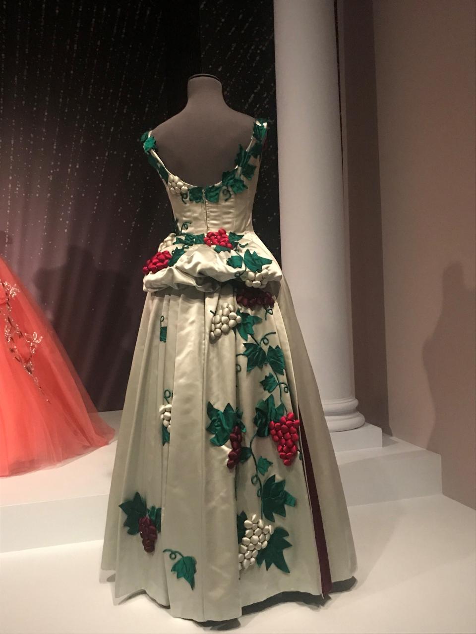 Ann Lowe's love of flowers and nature was often reflected in her designs. She made this 1963 silk and tulle gown with a lush dimensional satin grapevine motif for a St. Louis debutante.