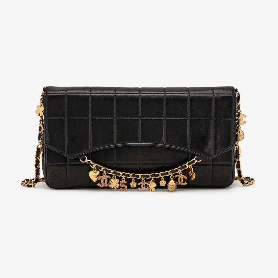 <p><a href="https://www.sothebys.com/en/buy/_chanel-black-quilted-lambskin-chocolate-bar-lucky-charms-chain-flap-bag-gold-hardware-2002-2003" rel="nofollow noopener" target="_blank" data-ylk="slk:Shop Now;elm:context_link;itc:0;sec:content-canvas" class="link ">Shop Now</a></p><p>Lucky Charms Chain Flap Bag</p><p>sothebys.com</p><p>$3900.00</p>