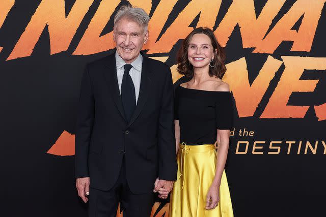 <p>John Salangsang/Shutterstock</p> Harrison Ford and Calista Flockhart