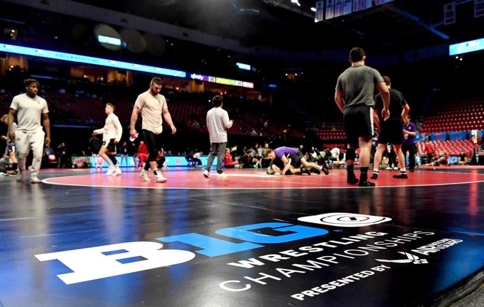 Wrestlers warm up for the Big Ten Wrestling Championships at the Xfinity Center at the University of Maryland on Saturday, March 9, 2024.