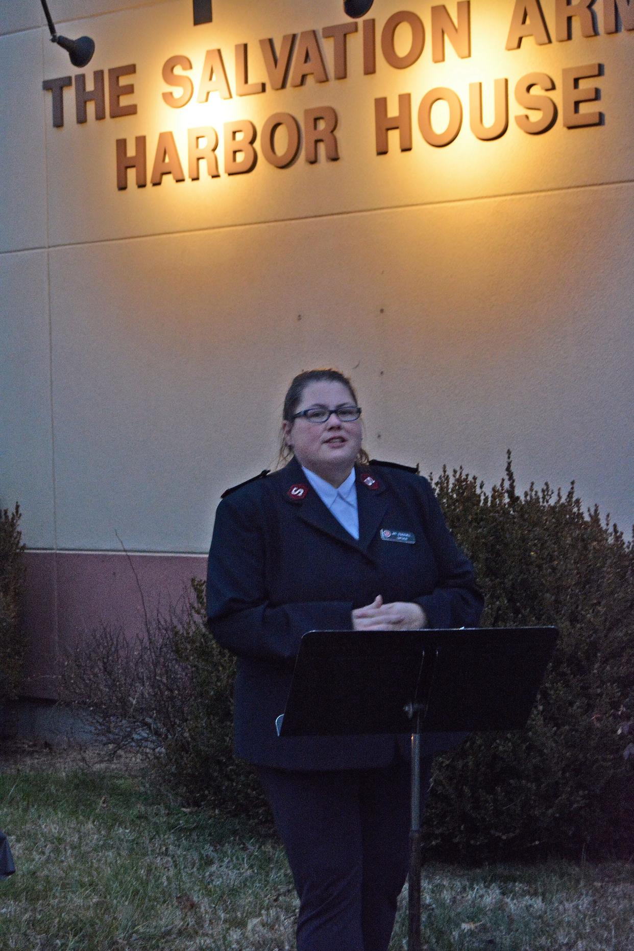 Columbia Salvation Army Capt. Amy Cedervall speaks Thursday evening at the Salvation Army Harbor House on North Ann Street during a memorial service for the city's unsheltered residents who died in 2023.