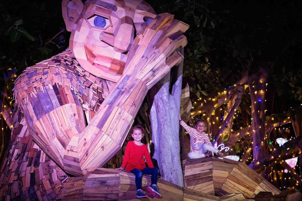 Children hang out on the giant troll at Pinecrest Gardens. Danish artist & designer Thomas Dambo made the trolls out of locally sourced recycled and repurposed wood.