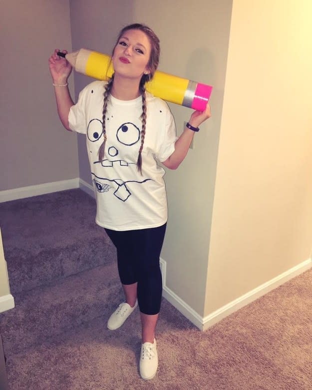 Someone dressed as Doodlebob while holding a giant pencil