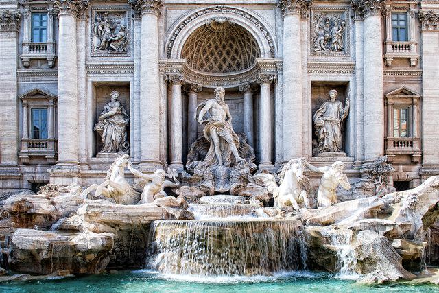 <p>Claude Gariepy/Getty</p> The famed Trevi Fountain in Rome