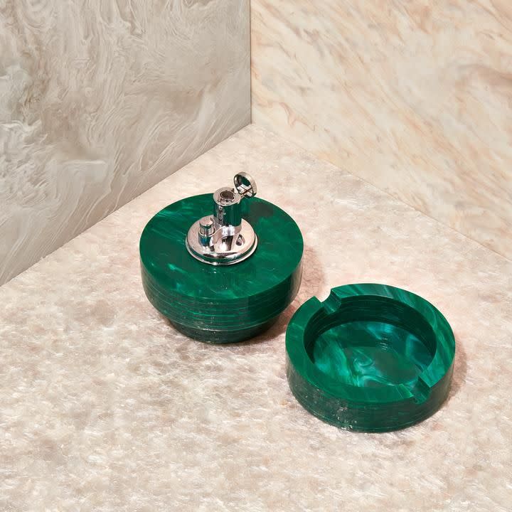 <p><a href="https://go.redirectingat.com?id=74968X1596630&url=https%3A%2F%2Fedie-parker.com%2Fproducts%2Ftable-top-lighter-in-malachite&sref=https%3A%2F%2Fwww.esquire.com%2Flifestyle%2Fg35953298%2Fbest-weed-accessories%2F" rel="nofollow noopener" target="_blank" data-ylk="slk:Shop Now;elm:context_link;itc:0;sec:content-canvas" class="link ">Shop Now</a></p><p>Tabletop Lighter</p><p>edie-parker.com</p><p>$450.00</p>