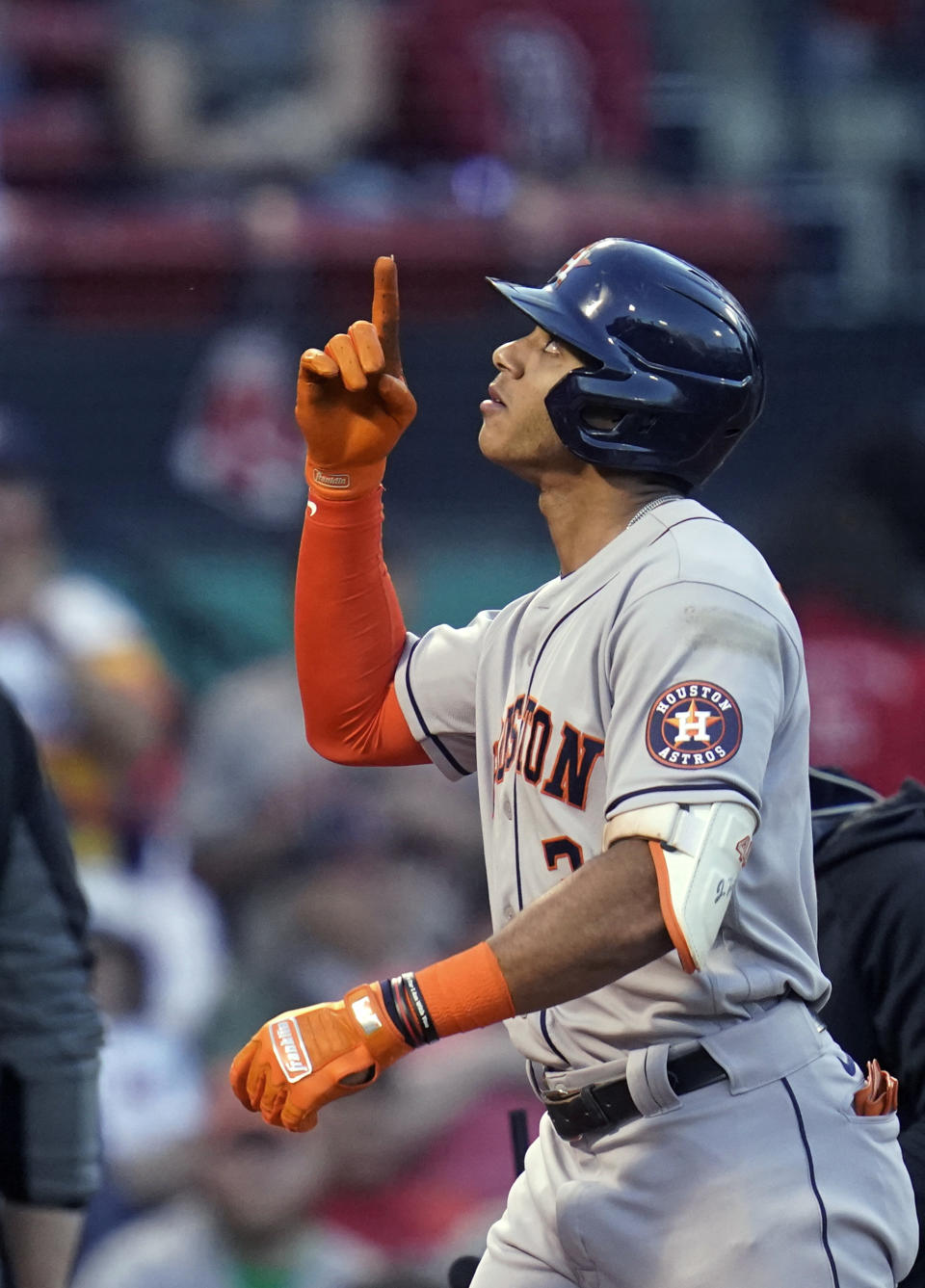 Houston Astros' Jeremy Pena points upward while crossing the plate on a solo home run during the second inning of a baseball game against the Boston Red Sox at Fenway Park, Tuesday, May 17, 2022, in Boston. (AP Photo/Charles Krupa)