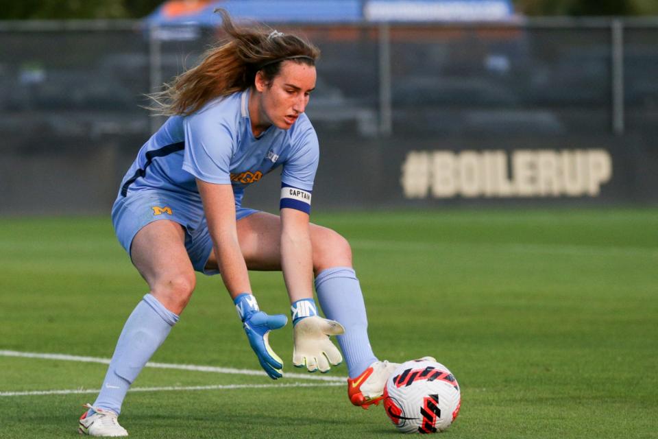 Michigan goalie Hillary Beall (1) makes a save during the first half of an NCAA women's soccer game, Thursday, Sept. 30, 2021 at Folk Field in West Lafayette.