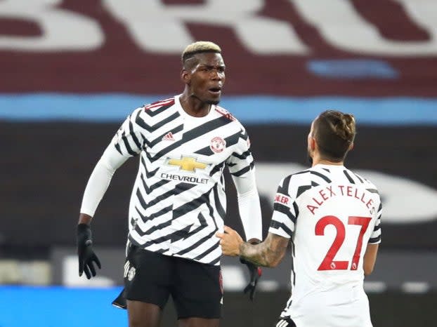 Paul Pogba of Manchester United celebrates with teammate Alex Telles (Getty)