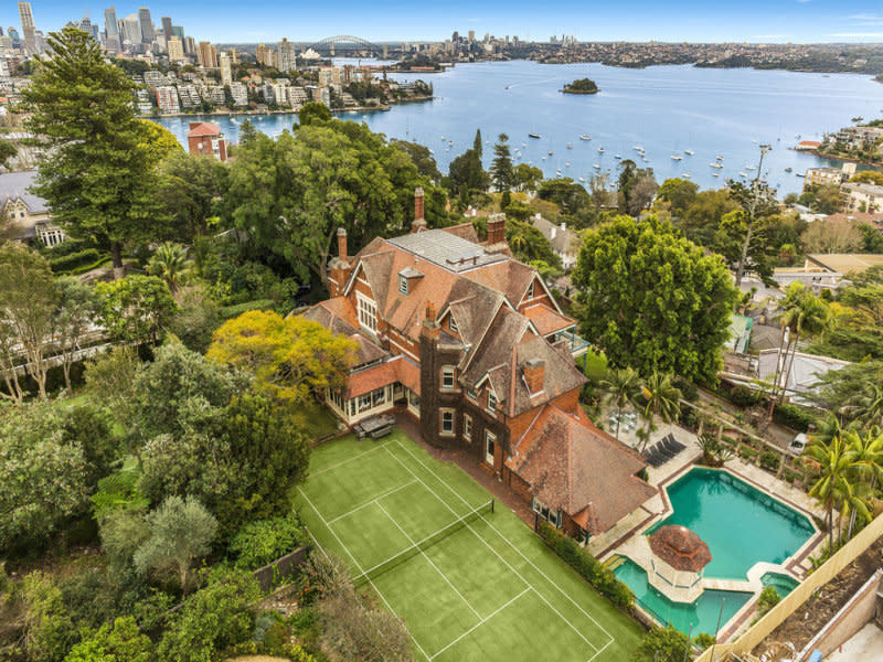 A sprawling Sydney estate with tennis court and pool overlooking Sydney harbour.