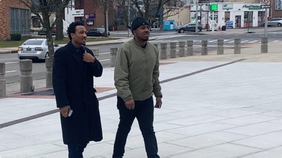 Quadri Salahuddin, left, and his brother Anwar Salahuddin, on Feb. 1, 2024, outside U.S. District Court in White Plains, where they are on trial with Jacob Carter on wire fraud and identity theft charges. The three are accused in a pandemic relief fraud case in which their applications led to more than $7 million in small business grants being sent to people who had no qualifying businesses and who passed along some of the money to the defendants.