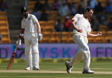 Australia's Mitchell Starc celebrates the wicket of India's Abhinav Mukund. REUTERS/Danish Siddiqui