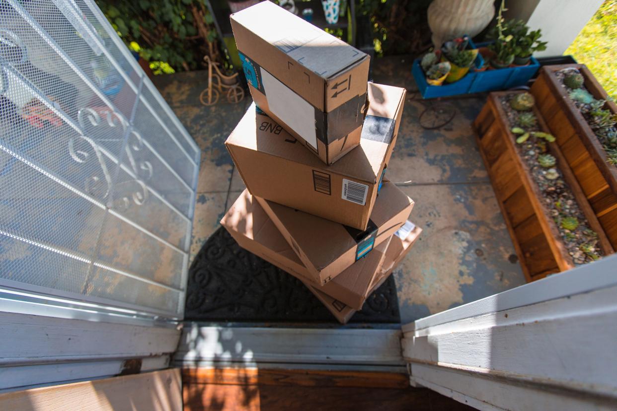 Amazon and other boxes at doorstep