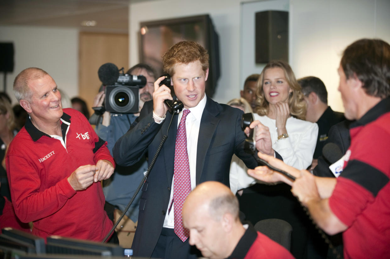 LONDON, UNITED KINGDOM - SEPTEMBER 12:  Prince Harry attends a fundraising day at the offices of BGC Partners on behalf of his charity Sentebale in Canary Wharf on September 12, 2011 in London, England. The Prince closed a record-breaking trade for 18 billion euros at the annual charity fundraising event organised by BGC who lost 658 employees during the terrorist attacks on the World Trade Center's twin towers on September 11, 2001 in New York.  (Photo by Paul Grover - WPA Pool/Getty Images)