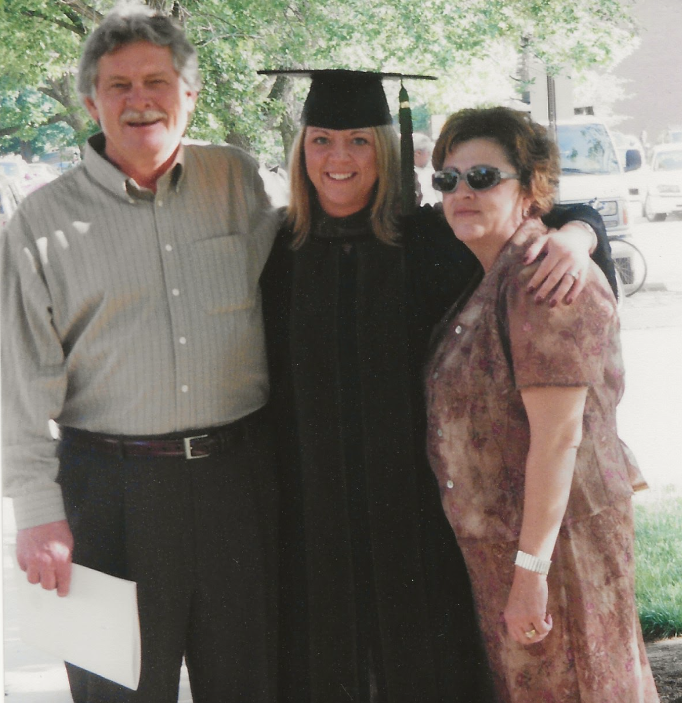 Ashleigh Anderson (center) graduated from Purdue University in 2004 with a doctorate of pharmacy. She is pictured here with her parents, Larry Anderson and Nancy Rockstroh, at her graduation ceremony.