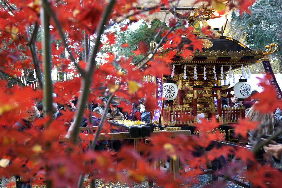 In this Tuesday, Dec. 3, 2019, photo, a mikoshi, a portable shrine, is displayed at the Chichibu Shrine during the Chichibu Night Festival in Chichibu, Japan. The Chichibu Night Festival, which has roots that go back more than 1,000 years, is one of three famous Japanese festivals to feature huge floats, which can top 7 meters (23 feet) and weigh up to 15 tons. (AP Photo/Toru Hanai)