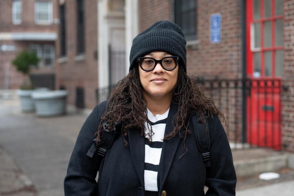 Columnist Erika D. Smith stands outside of the William Way Center in Philadelphia.