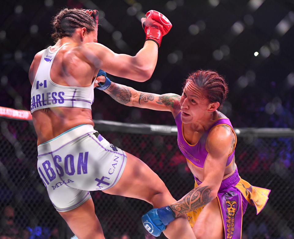 INGLEWOOD, CA - JANUARY 25: Julia Budd (red gloves) and Cris Cyborg (blue gloves) exchange blows during their featherweight world title fight at The Forum on January 25, 2020 in Inglewood, California. Cyborg won by TKO in the 4th round. (Photo by Jayne Kamin-Oncea/Getty Images)