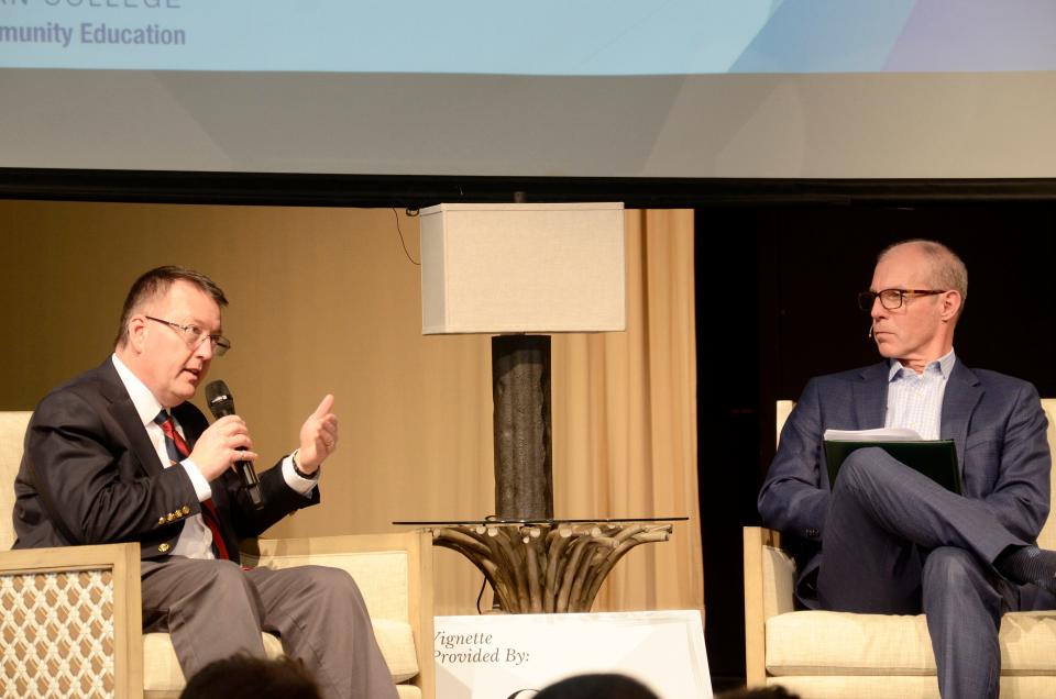 (From left) Dr. David Roland Finley, president of North Central Michigan College, is interviewed by Dan Ledingham on Friday, Feb. 3, 2023 during the Petoskey State of the Community.
