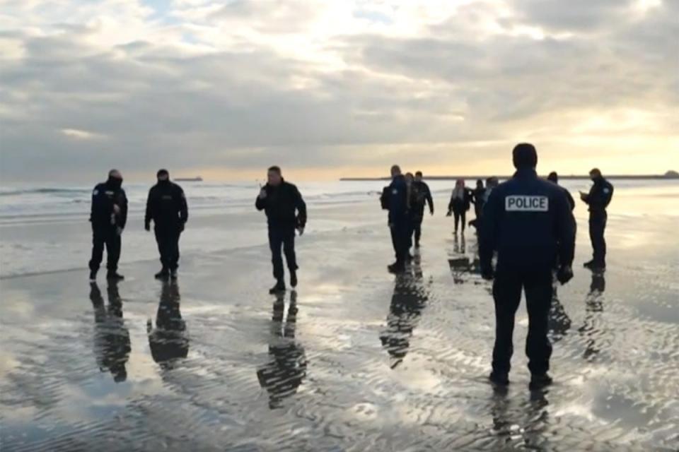 Footage from BBC News shows police on the beach at Dunkirk last Tuesday morning (BBC)