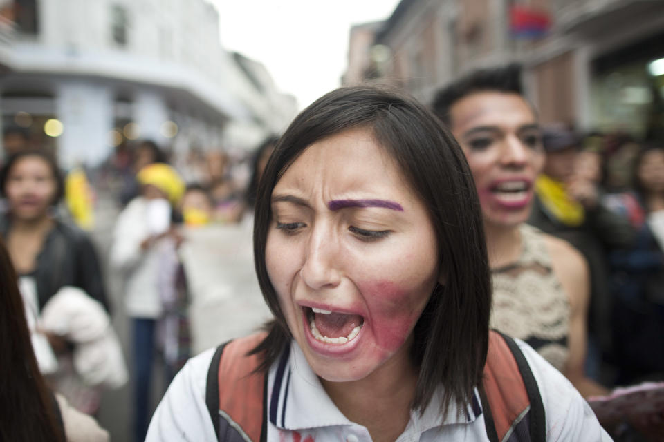 Feminist activists protest on the streets during a demonstration called 'Vivas Nos Queremos' to demand justice for all women victims of gender crimes on Nov. 26, 2016 in Quito, Ecuador.
