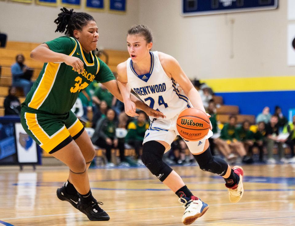 Lady Bruin's Ella Ryan (24) defends the ball against Lady Burro's Raegan Starks ( 34) Brentwood High School in Brentwood, Tenn., Tuesday, Feb. 7, 2023. 