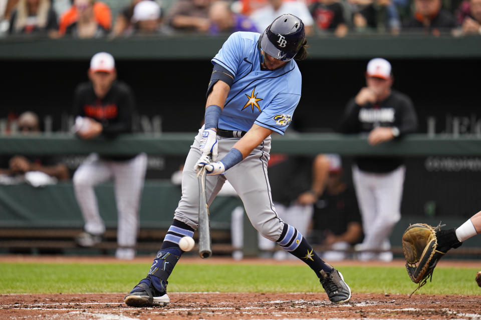 Tampa Bay Rays' Tristan Gray breaks his bat while grounding out against the Baltimore Orioles in the third inning of a baseball game, Sunday, Sept. 17, 2023, in Baltimore. (AP Photo/Julio Cortez)