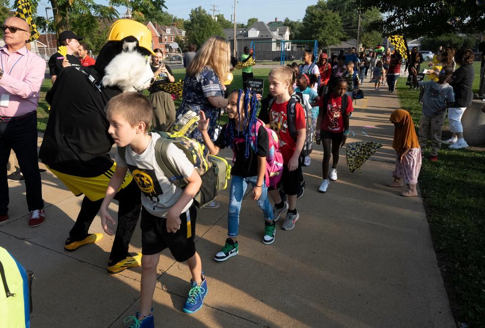 Students at Columbus City Schools' Avondale Elementary Schools walk in to applause and celebration Wednesday, Aug. 23, 2023 during a "Clap-in" for the first day of school for all students. The event featured mascots from the Columbus Crew and the Columbus Blue Jackets.