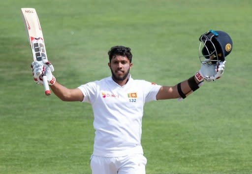 Kusal Mendis celebrates reaching his century for Sri Lanka