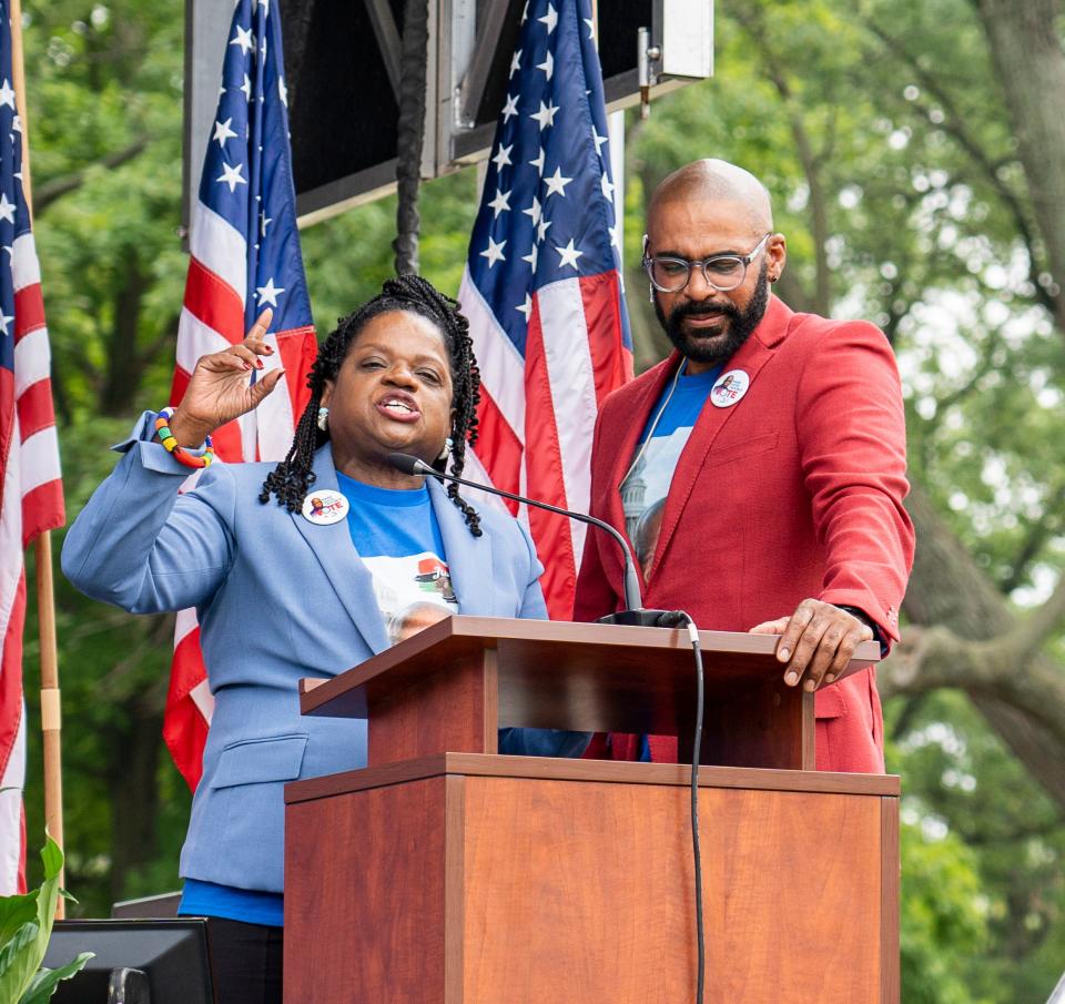 President and founder of the Transformative Justice Coalition Barbara Arnwine, left, and Board Chair Daryl Jones speak at an event in Sherman Park to celebrate the 58th anniversary of the Voting Rights Act on Saturday in Milwaukee.